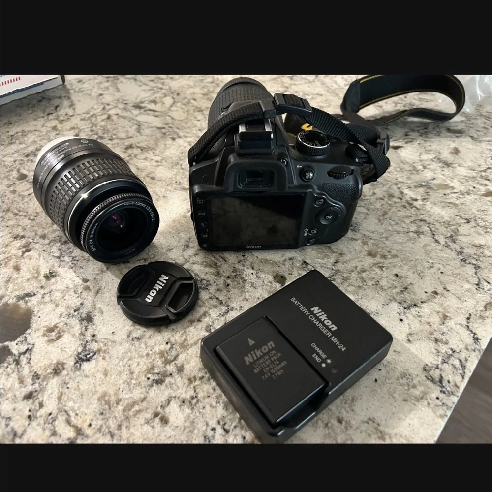 Nikon Black Digital Camera with Dual Lenses